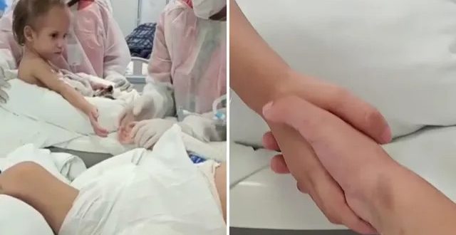 Valentina emociona equipe ao segurar pela 1ª vez a mão da irmã Heloá após cirurgia de separação das siamesas;